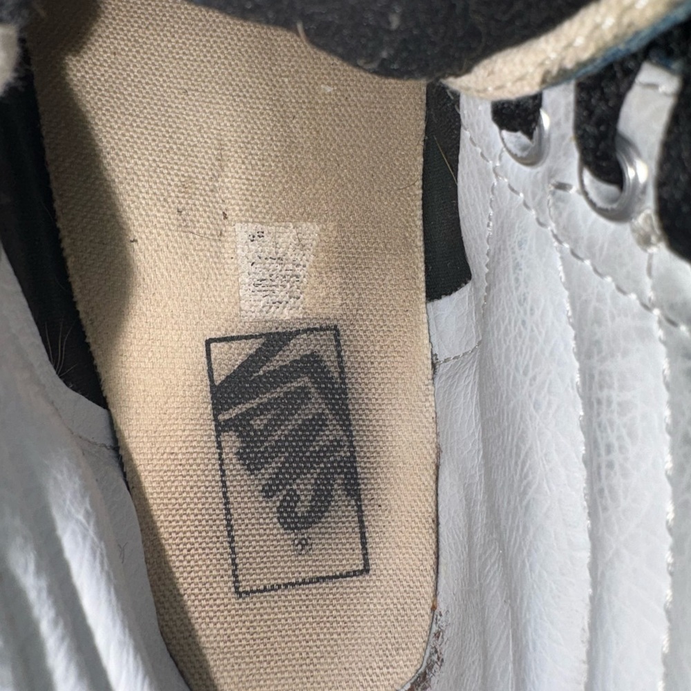 Vans Black and White High-Top Sneakers